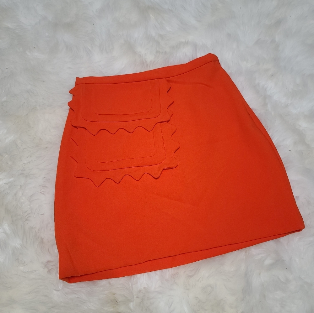 Victoria Beckham orange mini skirt